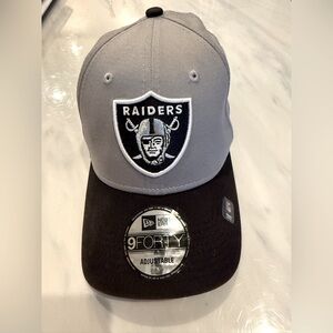 New Era Las Vegas Raiders 9Forty adjustable cap. NFL team merchandise.